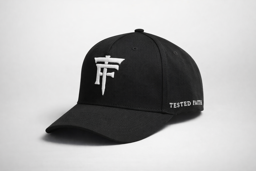 Black cap with white logo and text on a light gray background